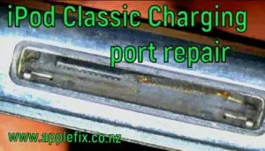 iPod Classic charging port repair showing 30 pin dock connector replacement on logic board