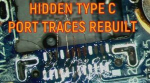Dell XPS laptop USB-C charging port motherboard repair showing hidden PCB trace reconstruction, broken charging pads repair, and advanced micro-soldering using 0.04mm jumper wire at AppleFix & Tech Engineers Hamilton New Zealand.