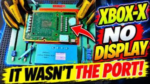 Xbox One X motherboard on a preheater station during HDMI retimer chip repair for a no display fault